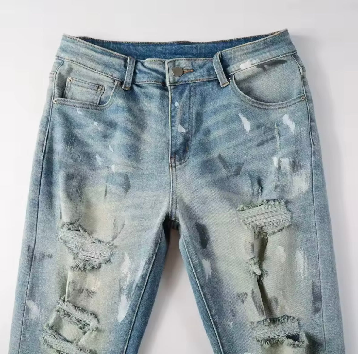 Distressed Slim-Fit Jeans – Light Wash with Paint Splatter Detail