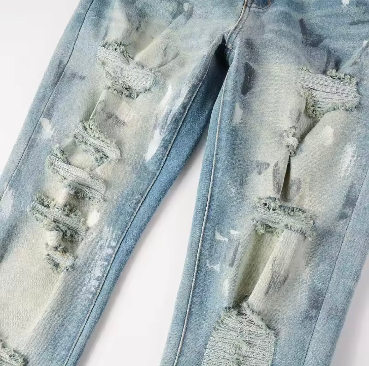 Distressed Slim-Fit Jeans – Light Wash with Paint Splatter Detail